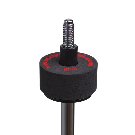 Cympad Optimizer Ride Washer placed on a cymbal stand, featuring red text. These washers are designed to enhance cymbal sound and performance, offering superior control and durability for drummers.
