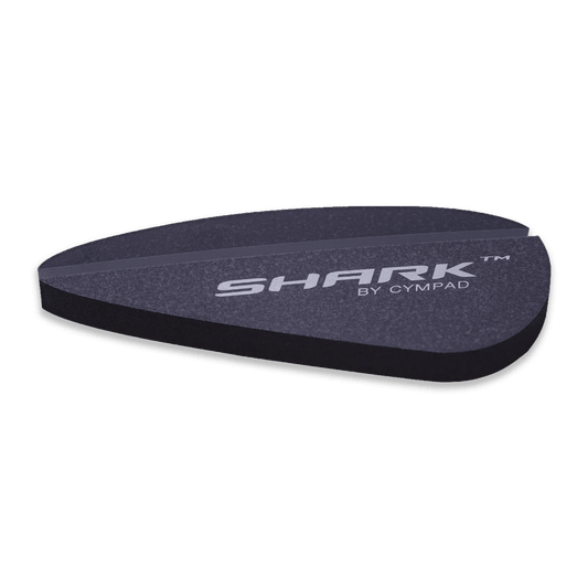 Cympad Shark drum dampener shaped like a shark fin, made from high-density foam. Attaches directly to drumheads to reduce overtones and control sustain, ideal for live performance and studio use.