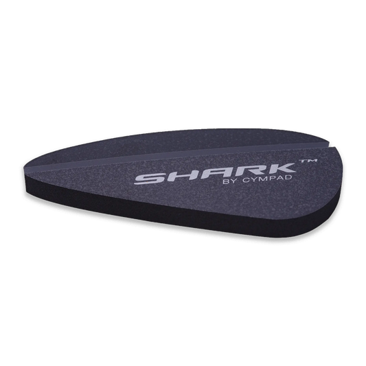Cympad Shark drum dampener shaped like a shark fin, made from high-density foam. Attaches directly to drumheads to reduce overtones and control sustain, ideal for live performance and studio use.