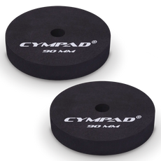 Two black Cympad Moderator cymbal washers, each 90mm in diameter, with a central hole and white printed branding that reads 'CYMPAD 90 MM.' The pads are round, made of cellular foam, and designed to reduce cymbal sustain and volume.